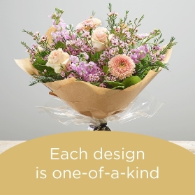 Hand Tied bouquet made with Seasonal Flowers