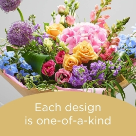 Superior Hand Tied Bouquet made with Seasonal Flowers