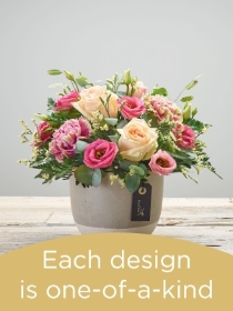 Arrangement made with seasonal flowers